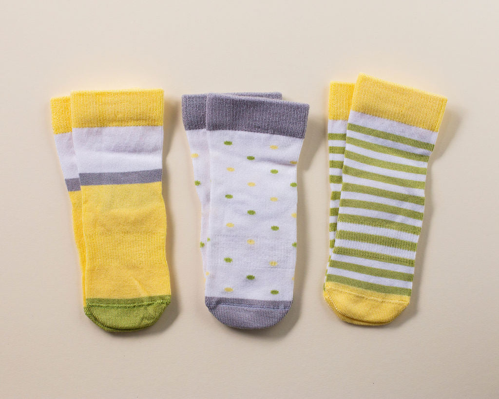 squid socks baby socks shark tank seen on tv socks that stay on grip socks baby newborn infant toddler child children kid kids crawl walk run feet toes best quality durable soft gentle good deal sale sales bamboo cotton polyester blend made in america american small business woman women entrepreneur baby shower easter christmas holiday gift winter warm snug boy girl neutral green yellow gray white pattern simple casual crew ankle poker dots stripes spring