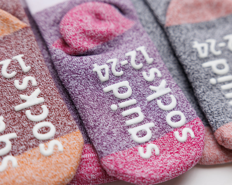 Chelsea cotton crew socks: close-up of contrasting heels and sole grips. Squid Socks, the brand seen on Shark Tank.