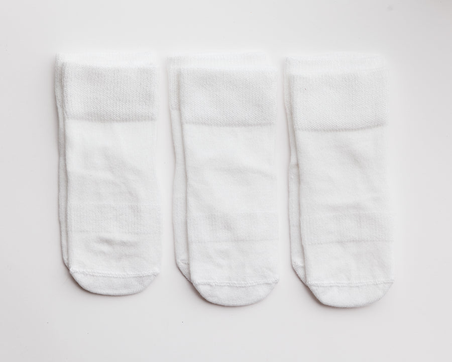 Cloud kids socks: three white socks laid flat. Squid Socks, the brand seen on Shark Tank.