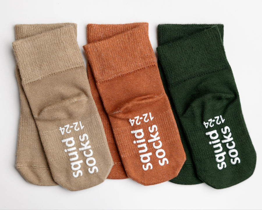 Cypress kids socks: three earth-tone socks with branded sole grips. Squid Socks, the brand seen on Shark Tank.