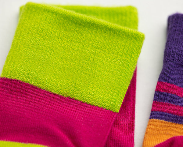 CeCe kids socks: close-up of neon green cuff and pink knit. Squid Socks, the brand seen on Shark Tank.