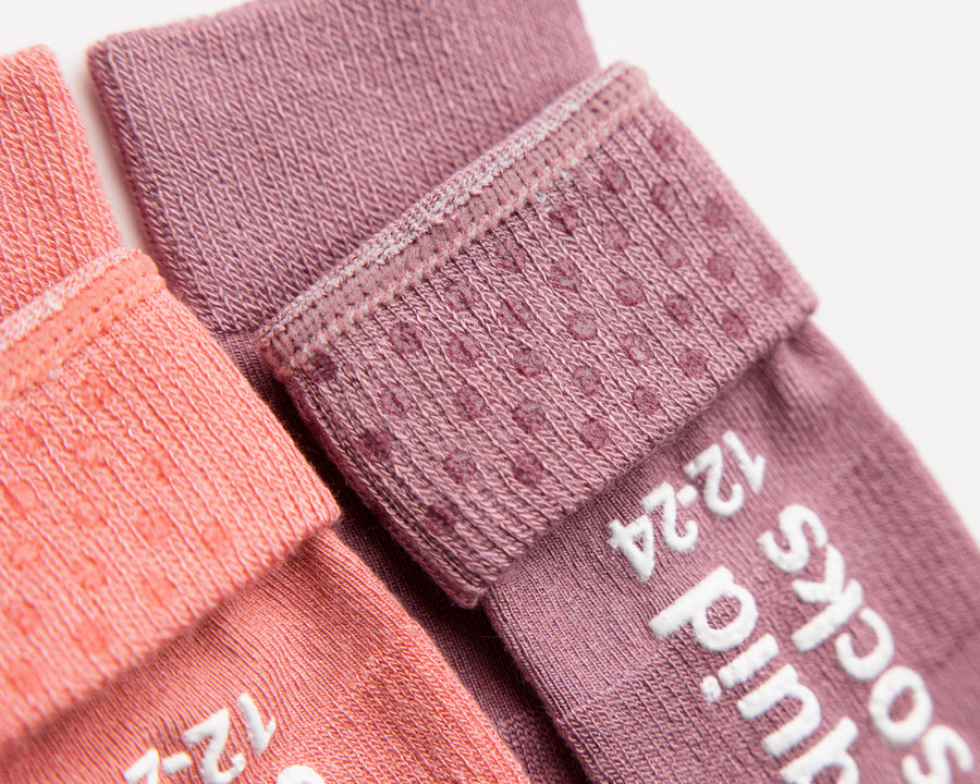 Cami kids socks: close-up of lavender cuff dots and sole grips. Squid Socks, the brand seen on Shark Tank.