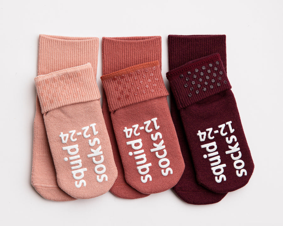 Courtney cotton crew socks: pink and burgundy crew socks showing cuff and sole grips. Squid Socks, the brand seen on Shark Tank.
