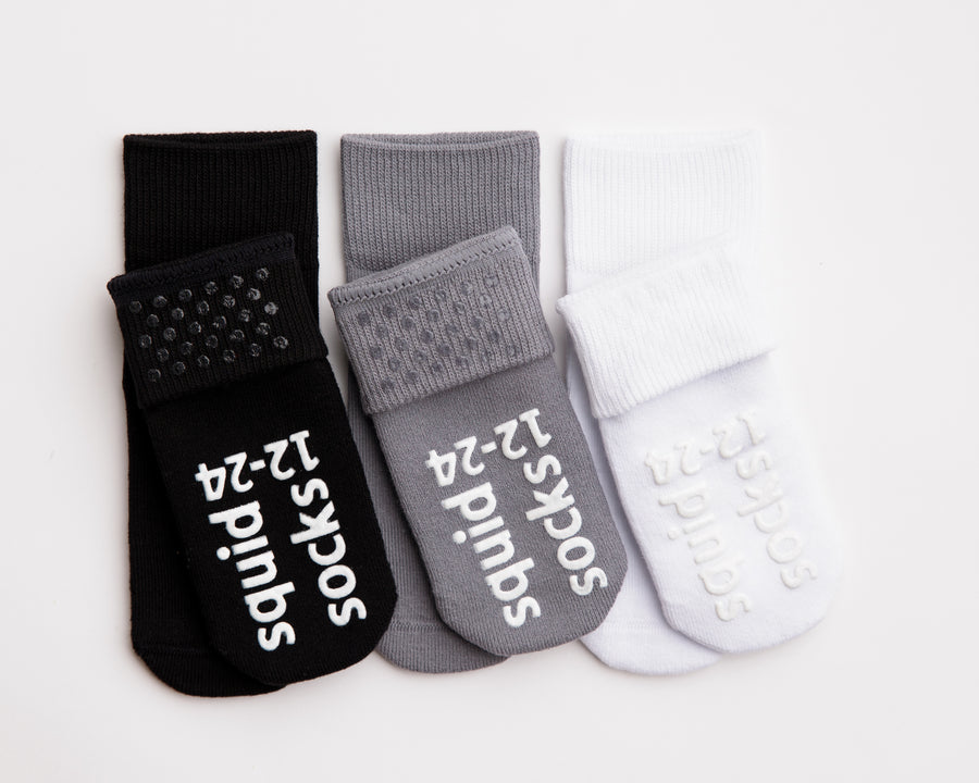 Casey cotton crew socks: black, gray and white crew socks showing sole grips. Squid Socks, the brand seen on Shark Tank.