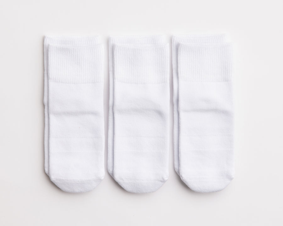 Dove cotton crew socks: three white cotton crew socks laid flat. Squid Socks, the brand seen on Shark Tank.