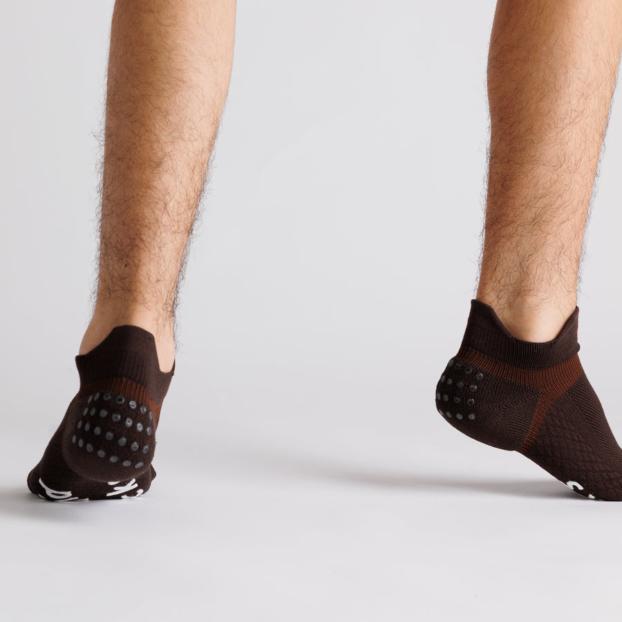 Brown ankle grip socks viewed from behind, showing heel grip dots. By Squid Socks.