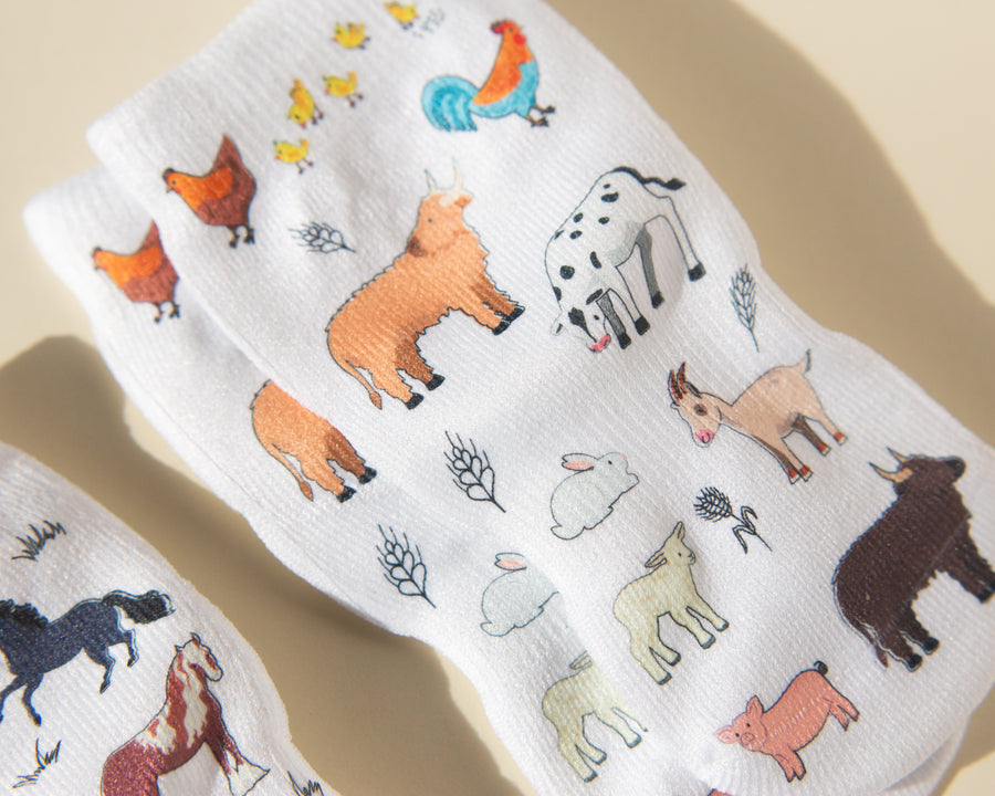 Cowboy kids socks: white socks with farm animal prints. Squid Socks, the brand seen on Shark Tank.