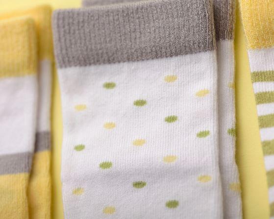 squid socks baby socks shark tank seen on tv socks that stay on grip socks baby newborn infant toddler child children kid kids crawl walk run feet toes best quality durable soft gentle good deal sale sales bamboo cotton polyester blend made in america american small business woman women entrepreneur baby shower easter christmas holiday gift winter warm snug boy girl neutral green yellow gray white pattern simple casual crew ankle poker dots stripes spring