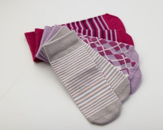 Christina kids socks: three striped and argyle socks arranged together. Squid Socks, the brand seen on Shark Tank.