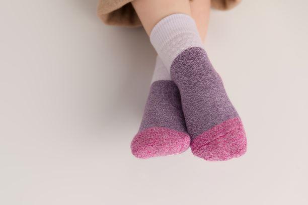 Chelsea cotton crew socks: baby wearing lavender-cuff crew socks. Squid Socks, the brand seen on Shark Tank.