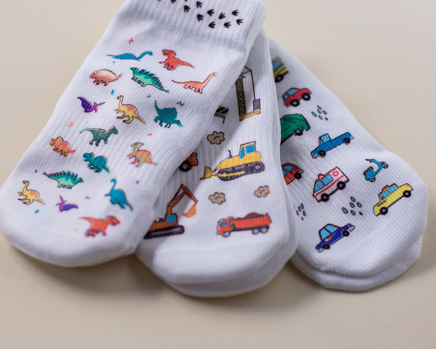 Cohen kids socks: three printed socks stacked at an angle. Squid Socks, the brand seen on Shark Tank.