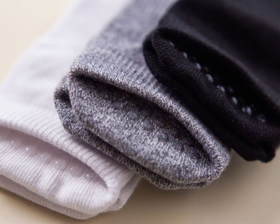 Crew ankle socks: close-up of white, gray and black ankle sock toes. Squid Socks, the brand seen on Shark Tank.
