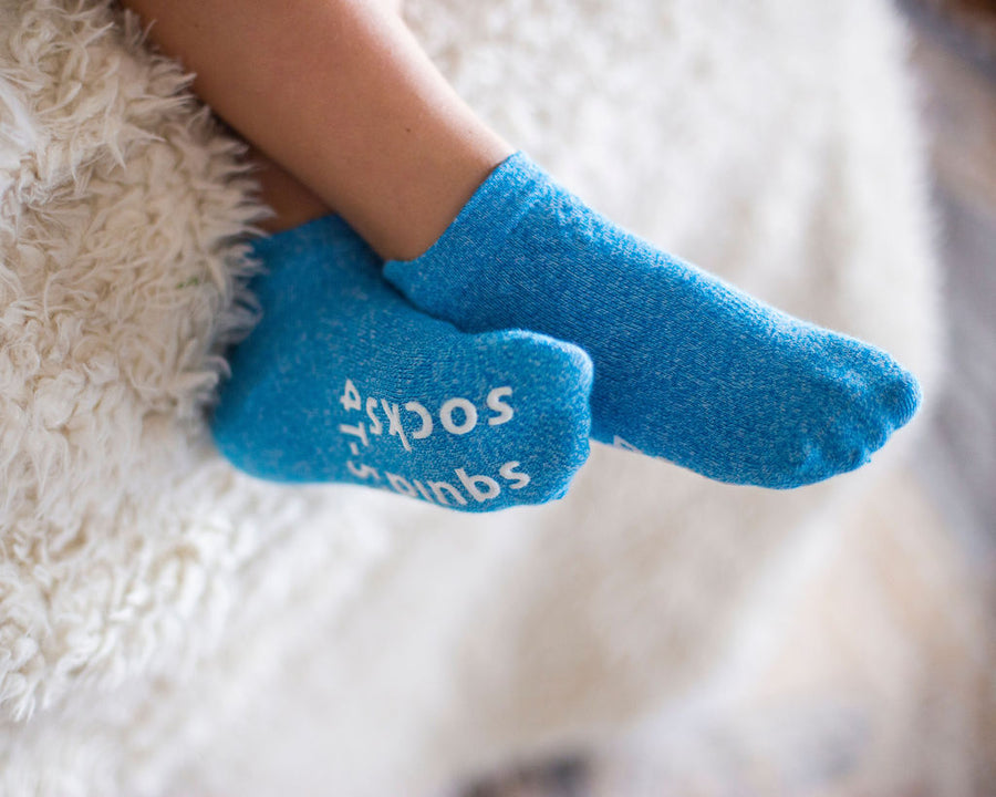 Chevy ankle socks: child wearing blue ankle socks with a sole visible. Squid Socks, the brand seen on Shark Tank.