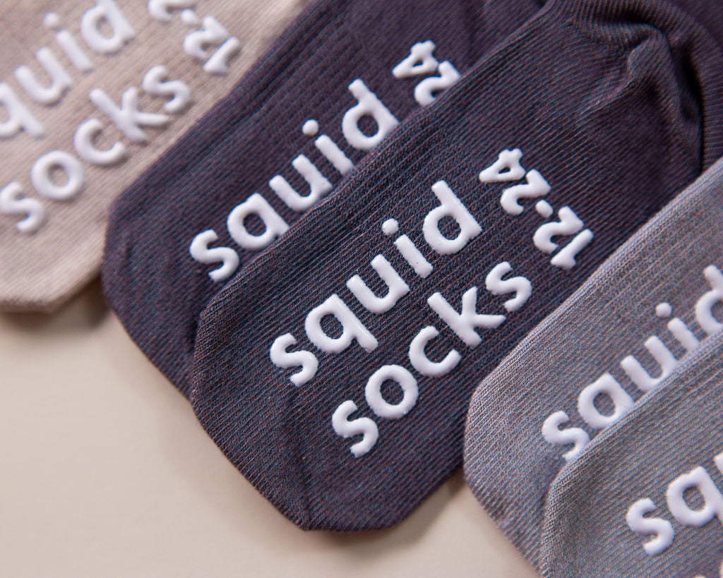 squid socks baby socks shark tank seen on tv socks that stay on grip socks baby newborn infant toddler child children kid kids crawl walk run feet toes best quality durable soft gentle good deal sale sales bamboo cotton polyester blend made in america american small business woman women entrepreneur baby shower easter christmas holiday gift winter warm snug boy girl neutral sand pastel light dark gray tan solid plain simple casual crew ankle