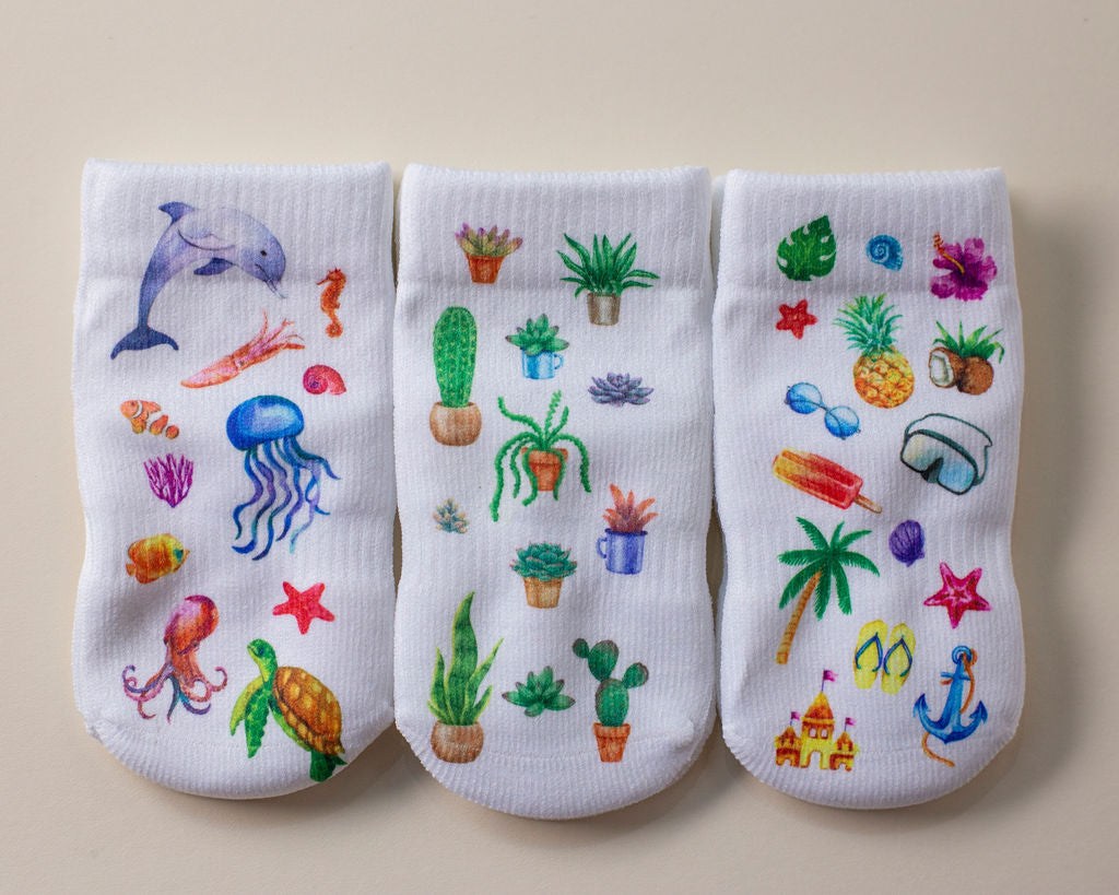 squid socks baby socks shark tank seen on tv socks that stay on grip socks baby newborn infant toddler child children kid kids crawl walk run feet toes best quality durable soft gentle good deal sale sales bamboo cotton polyester blend made in america american small business woman women entrepreneur baby shower easter christmas holiday gift winter warm snug neutral boy girl white bright solid print pattern plain simple casual crew ankle ocean cacti cactus tropical