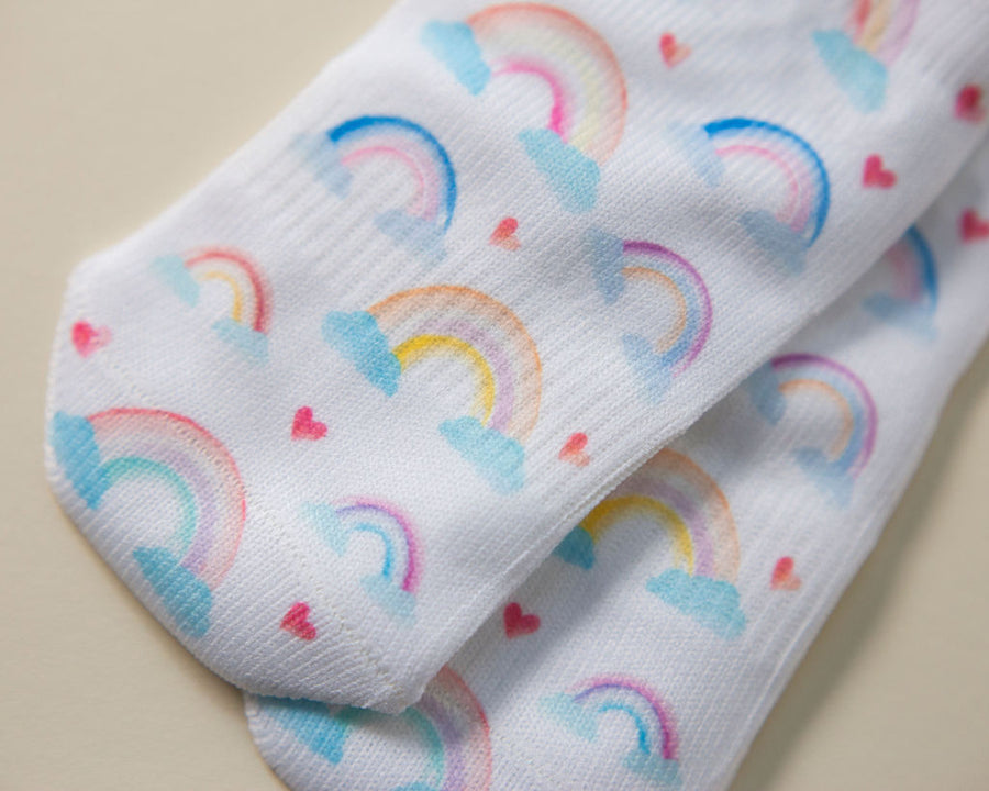 Chloe kids socks: white socks with colorful rainbow prints. Squid Socks, the brand seen on Shark Tank.