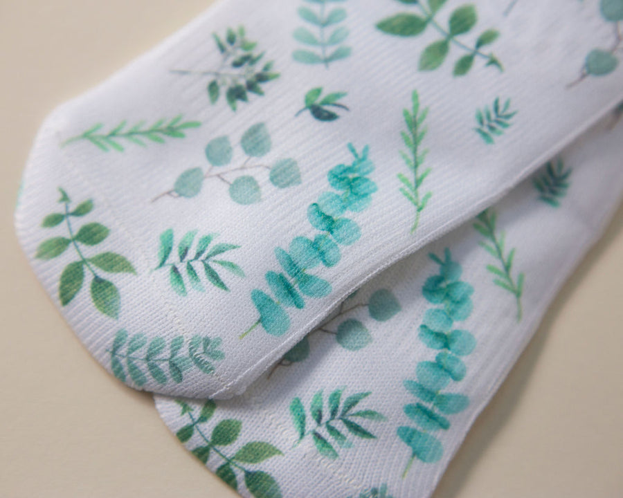 Chloe kids socks: white socks with green foliage prints. Squid Socks, the brand seen on Shark Tank.