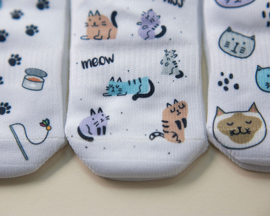 Meow kids socks: close-up of cat-print toes. Squid Socks, the brand seen on Shark Tank.