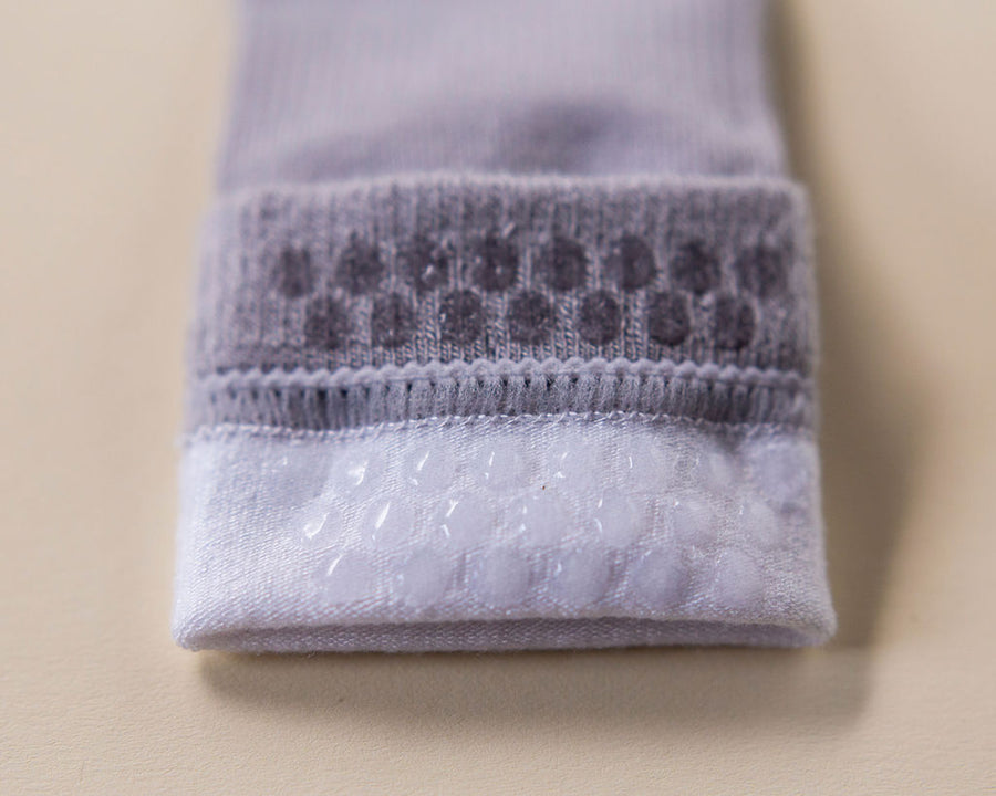 Cruz kids socks: close-up of gray silicone dots inside a folded cuff. Squid Socks, the brand seen on Shark Tank.