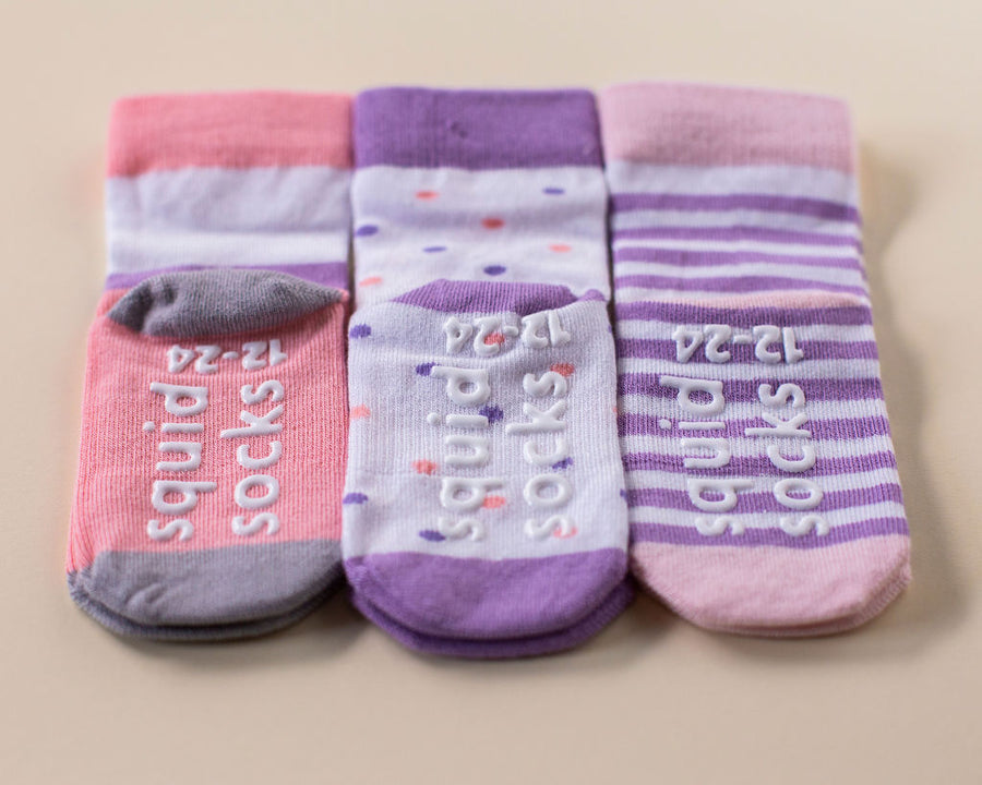 Caroline kids socks: three patterned socks with branded sole grips. Squid Socks, the brand seen on Shark Tank.