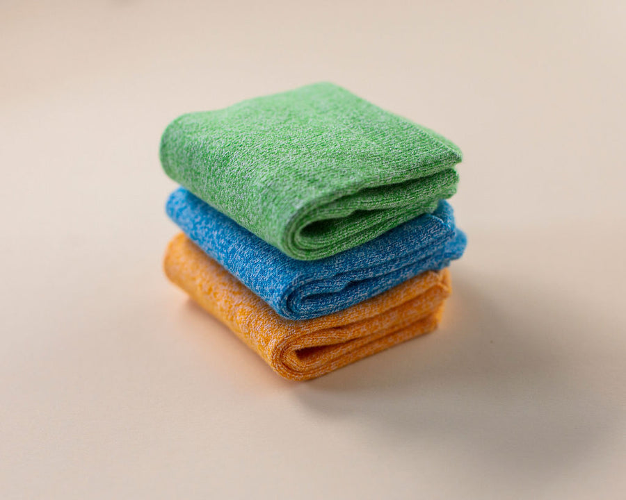 Chevy ankle socks: stack of green, blue and orange ankle socks. Squid Socks, the brand seen on Shark Tank.