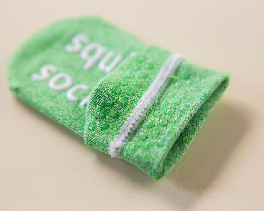 Chevy ankle socks: green ankle sock showing cuff dots and sole grips. Squid Socks, the brand seen on Shark Tank.