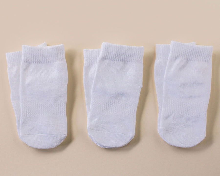 Cleary ankle socks: three white ankle socks laid flat. Squid Socks, the brand seen on Shark Tank.